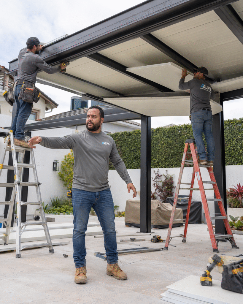 Alfe Construction contractor installing insulated roof panels on a residential home in Orlando, Central Florida