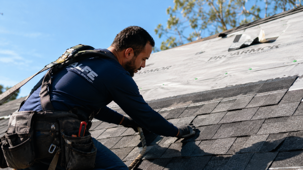 Certified Alfe Construction contractor installing a new roof on a residential home in Orlando, Central Florida