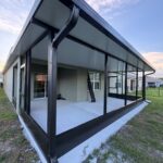 Screen room with insulated roof at dusk in the Orlando area